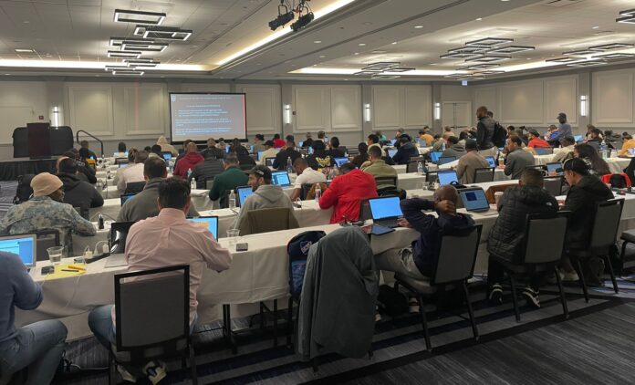Candidates taking the FIFA Football Agent Exam in Chicago during the 2024 in person exam session.