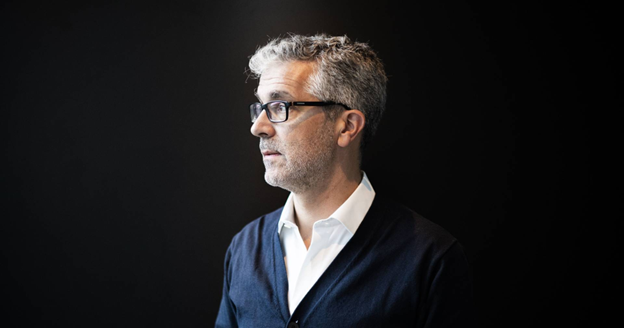 Rui Lança, Executive Director at Al-Ittihad Club, in profile view against a black background.