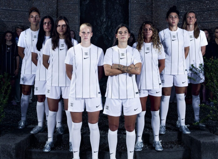 F.C. Como Women players model the new 2025/26 Nike kits during “The Next Wave” campaign photoshoot on the shores of Lake Como.