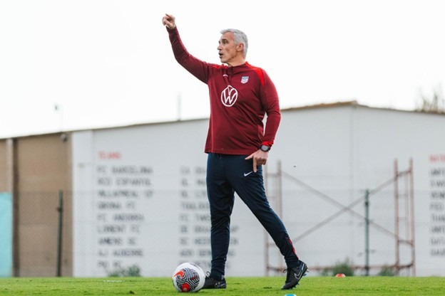 Alex Covelo coaching on the training pitch during a session with the U.S. national team setup.