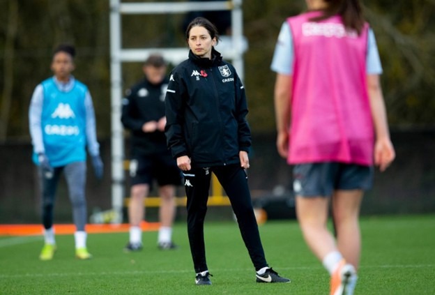 Jenny Sugarman coaching on the training pitch during a women’s football session.