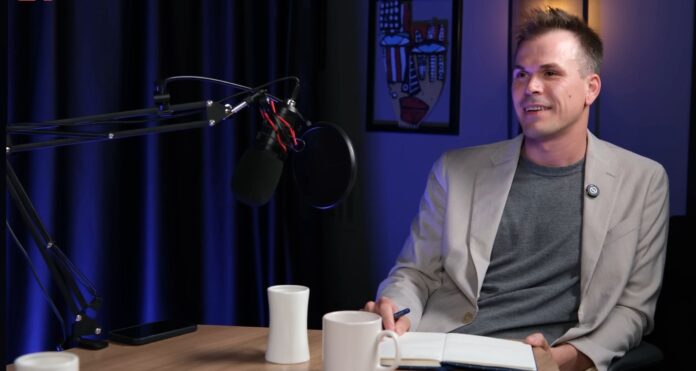 Okan Özkan during an interview, reflecting on his career from youth coaching to football executive roles at Fenerbahçe.