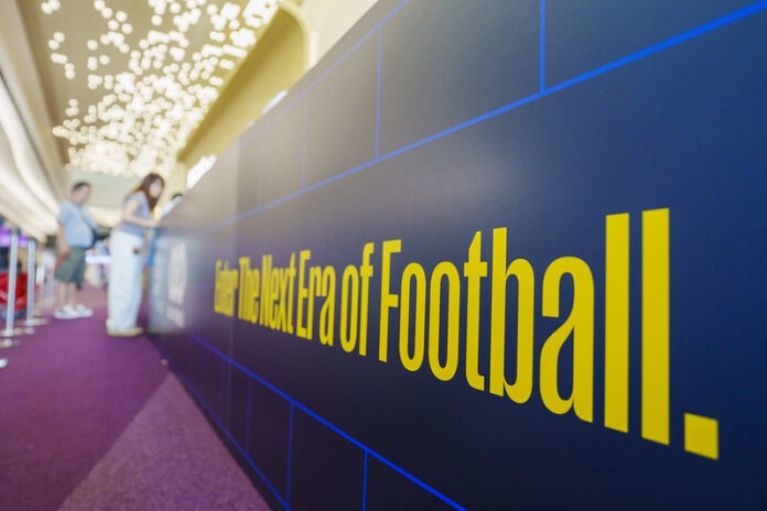 World Football Summit Hong Kong 2025 banner with the slogan “Enter the Next Era of Football” at the AsiaWorld-Expo venue.