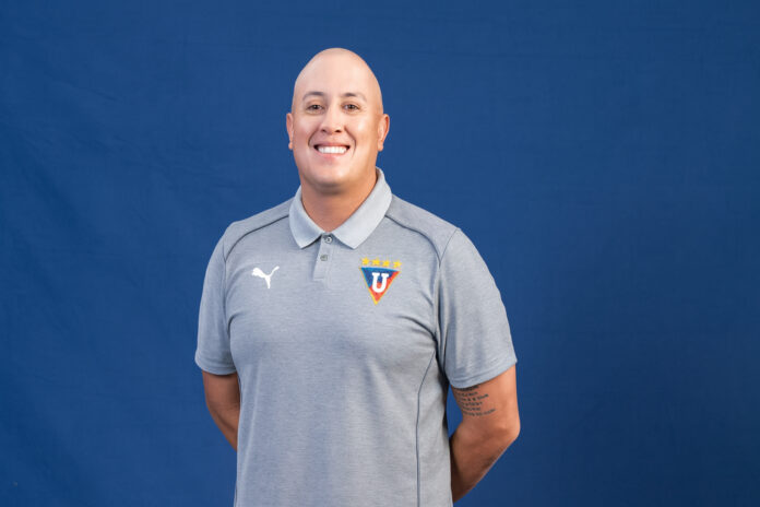 Diego Vilela Alcala Diego Vilela Alcalá standing confidently in front of stadium seating, reflecting his work in player development and modern football methodology.