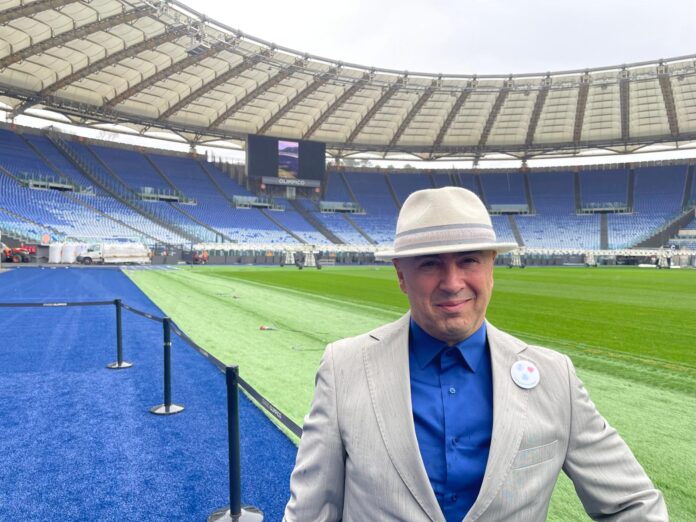 Football data and scouting expert Tarkan Batgun at Stadio Olimpico in Rome, reflecting elite-level decision making and analysis.