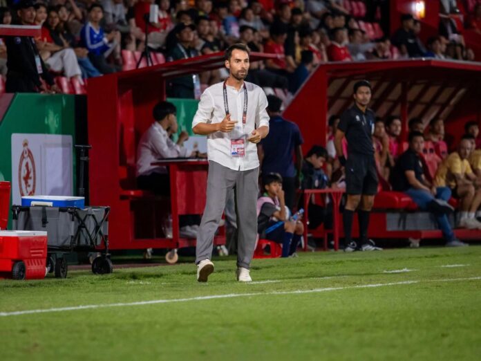 Alex Dorado 2 Alex Dorado coaching from the touchline during a competitive match in Cambodia