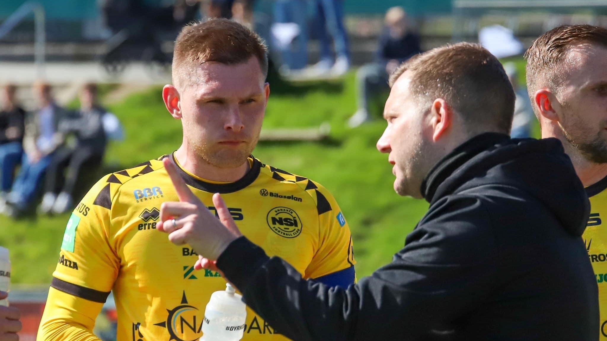 Jens Wedeborg giving tactical instructions to a player during a match.
