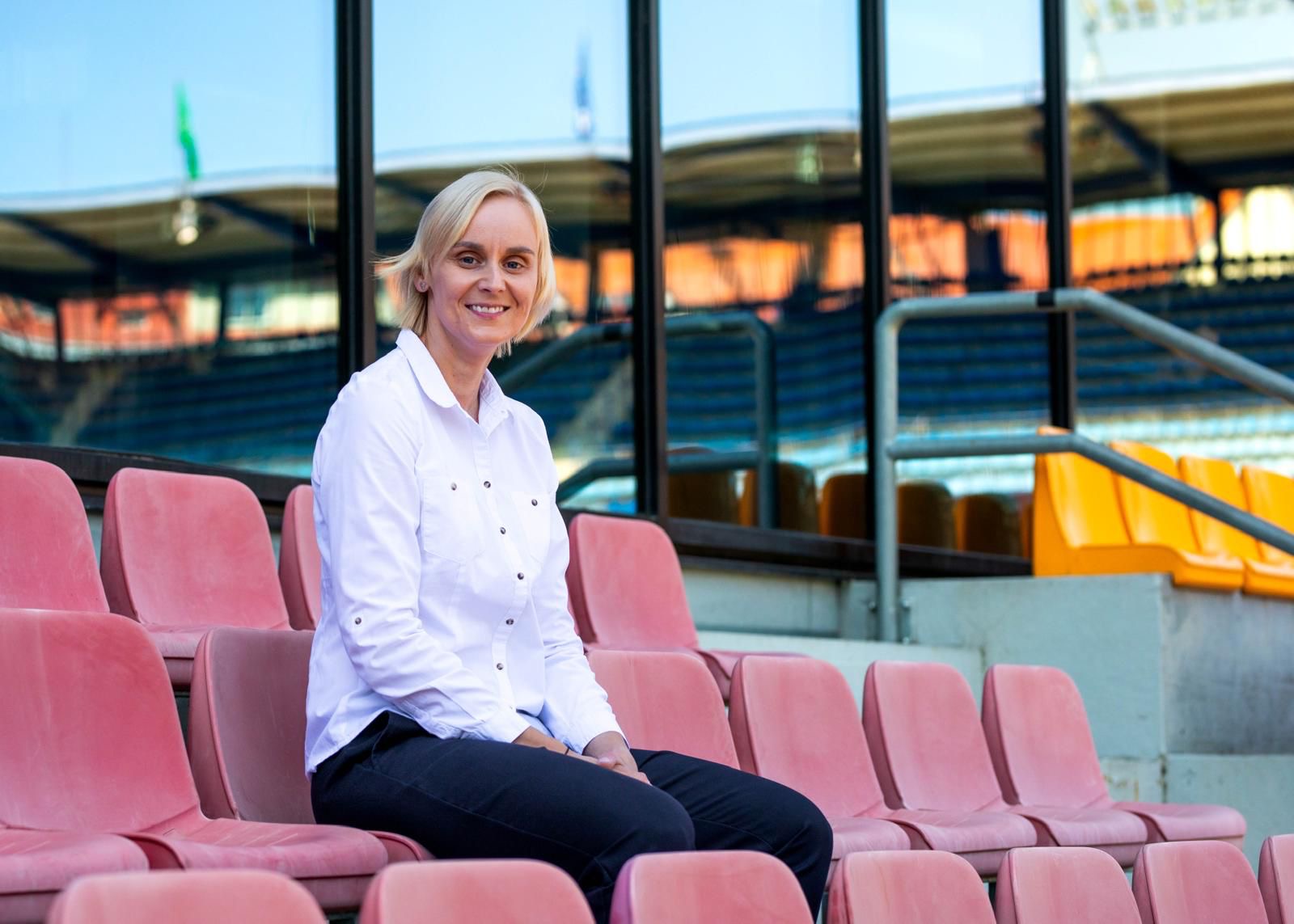 Pavla Satrapova seated in stadium stands at Sparta Praha reflecting leadership in women’s football development