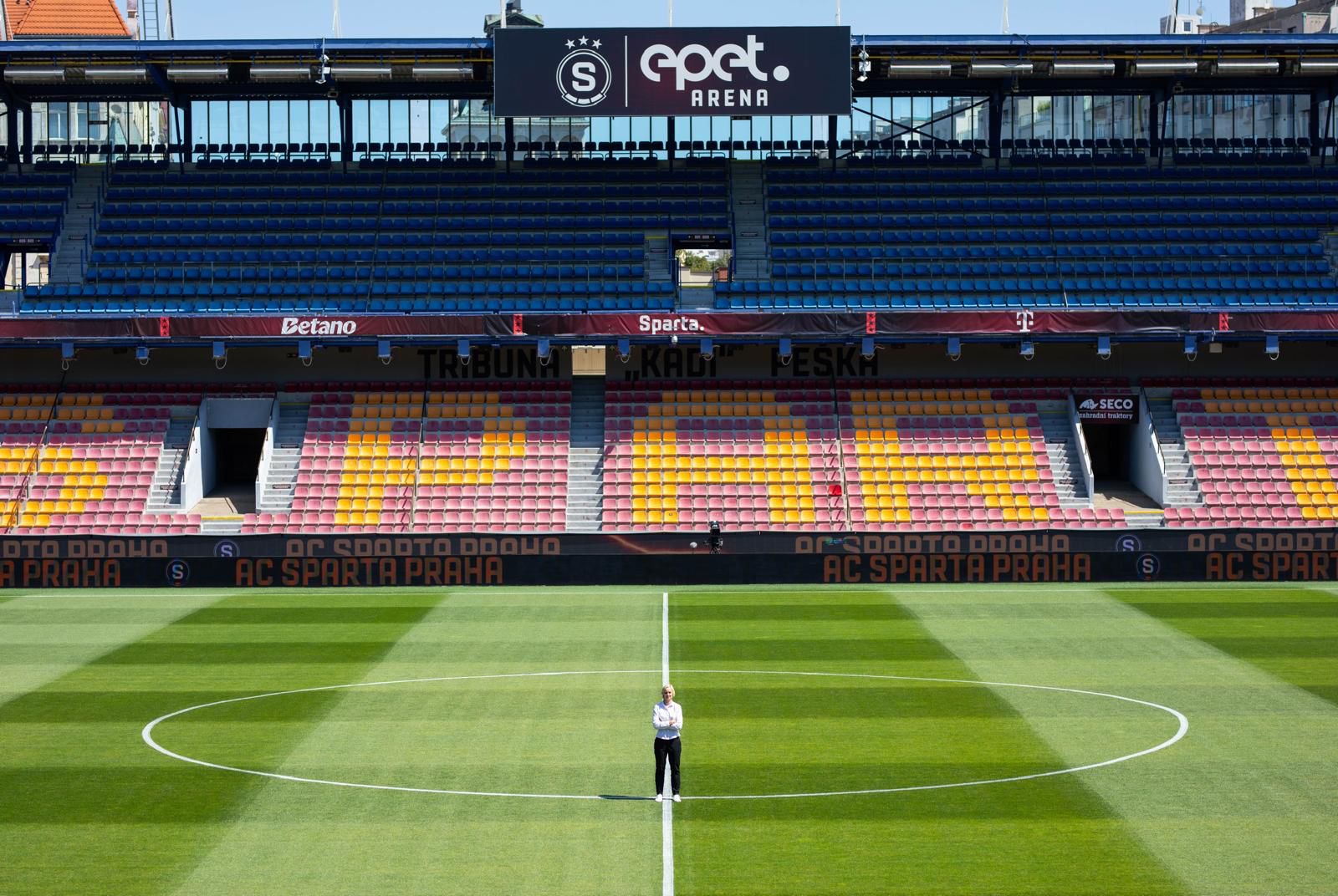Pavla Satrapova standing at centre pitch at AC Sparta Praha stadium highlighting leadership in women’s football structure