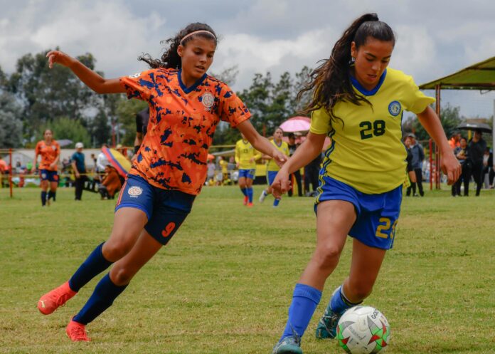 South American youth women football players competing in a match, reflecting U-20 development and emerging talent