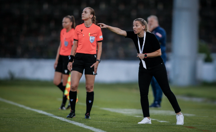 Silviya Radoyska coaching from the touchline during a women’s football match in Bulgaria.