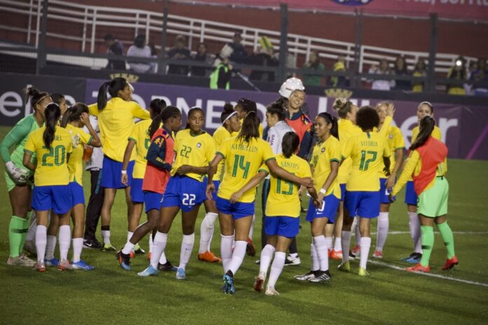 Brazil women’s football players celebrating together, reflecting youth development and the future of women’s football.