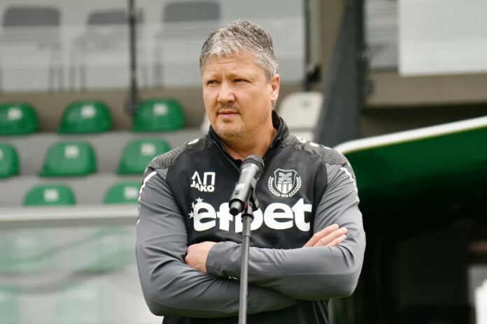 Lyuboslav Penev stands pitchside as his career as a Bulgarian football striker and coach is profiled.
