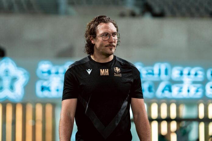 Michael Hefele in Al Diraiyah training kit, reflecting his coaching experience across international football.