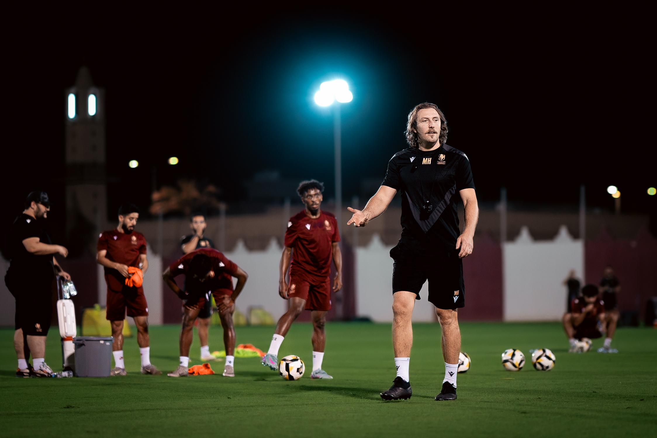 Michael Hefele leading a training session, reflecting adaptability, leadership and team preparation.