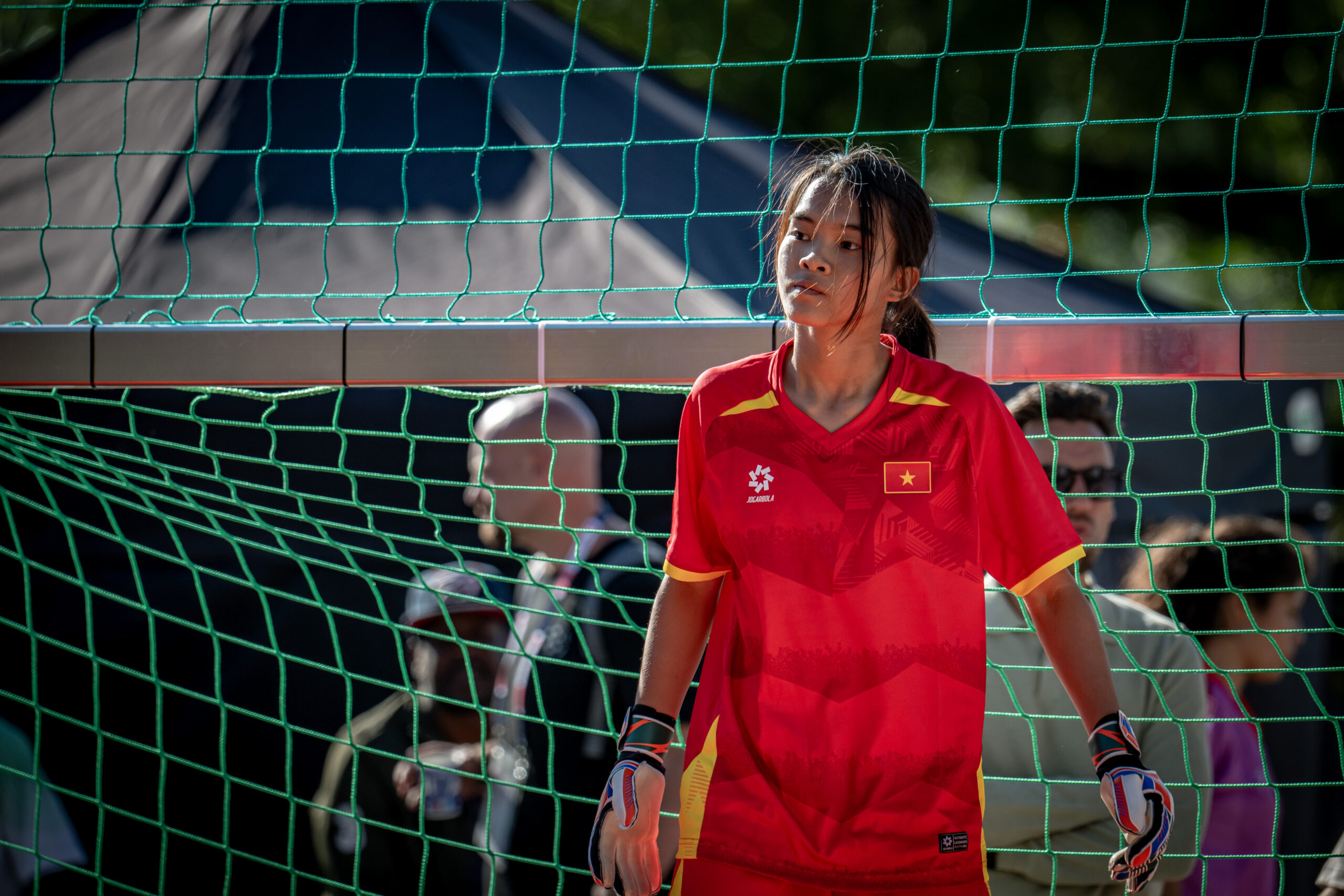 Goalkeeper waits for play during a Homeless World Cup match.