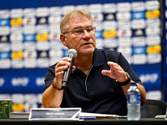 Frank K. Ludolph speaking at a football education event