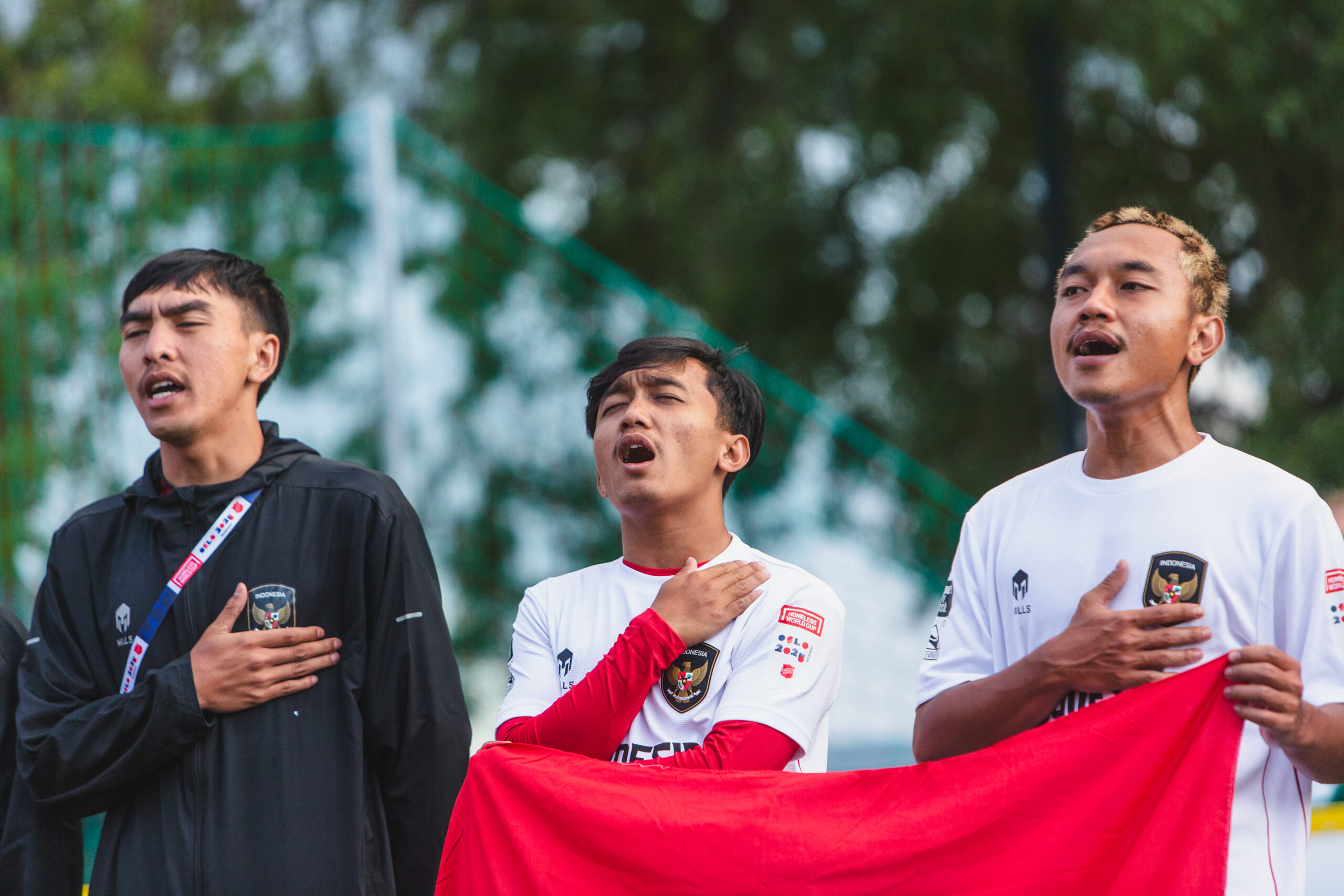 Indonesia players sing before a Homeless World Cup match.