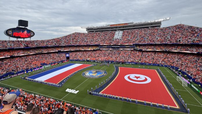 Netherlands and Tunisia flags displayed before their 2026 FIFA World Cup match in Kansas City.