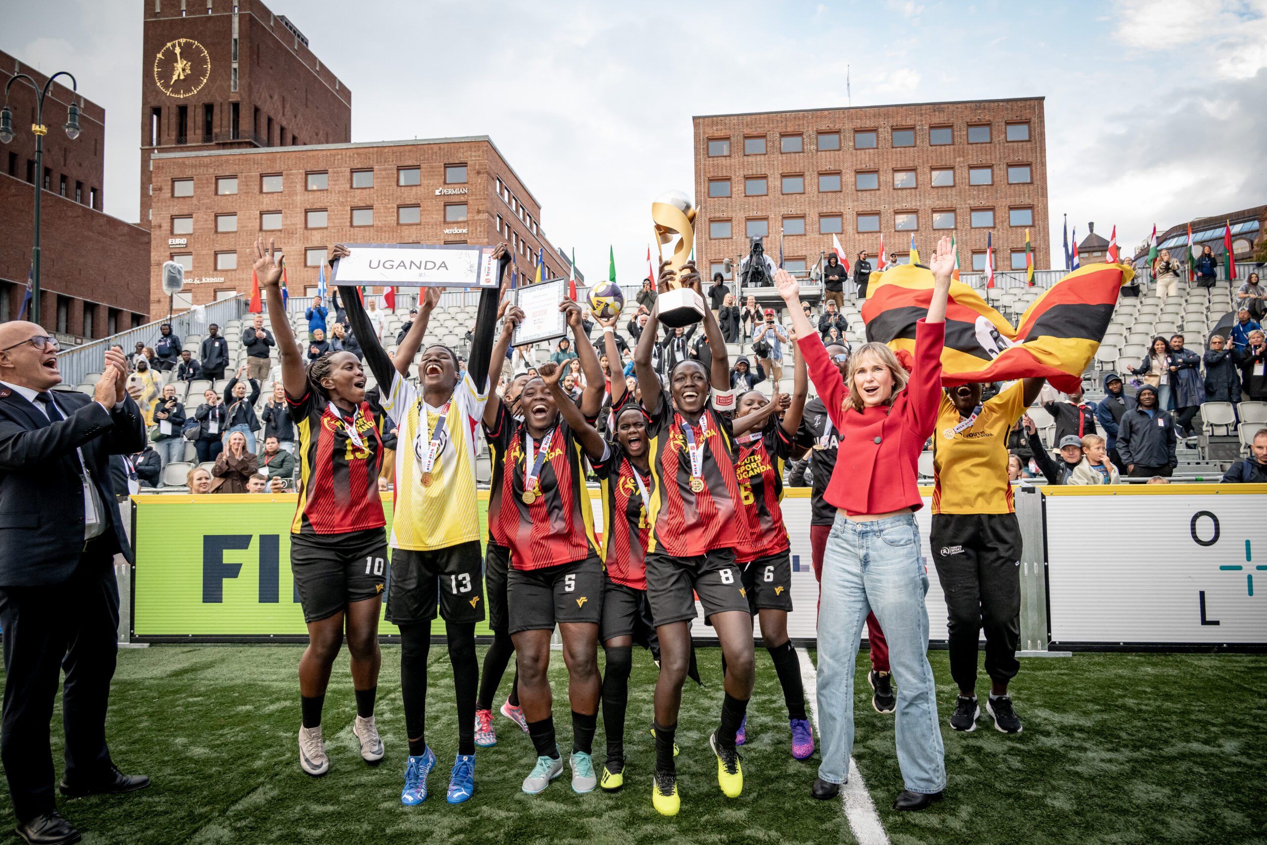 Uganda women celebrate victory at the Homeless World Cup.