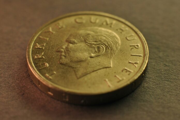 Turkish lira coin representing the financial pressures and sustainability challenges facing Galatasaray and Fenerbahçe.