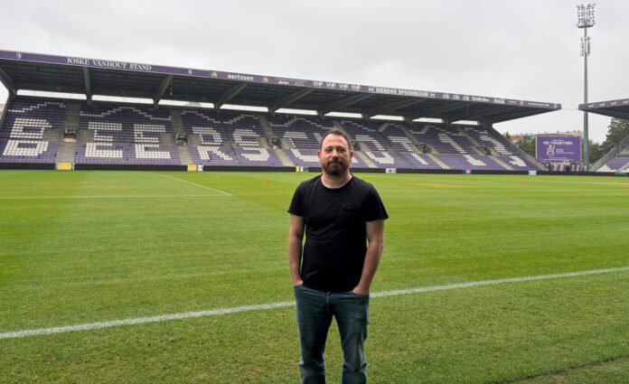 Dehan Ögetbil at Beerschot’s stadium, where he serves as Chief Scout overseeing player recruitment and scouting.