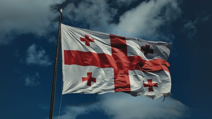 Georgian national flag representing Georgia’s emergence as a major source of football talent for European clubs.
