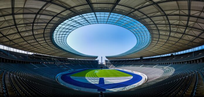 Empty football stadium representing the financial planning behind GAM and TAM in MLS roster construction.