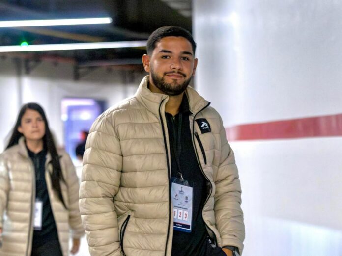 Javier Semeler, football scouting and data analysis professional, attending a sporting event.