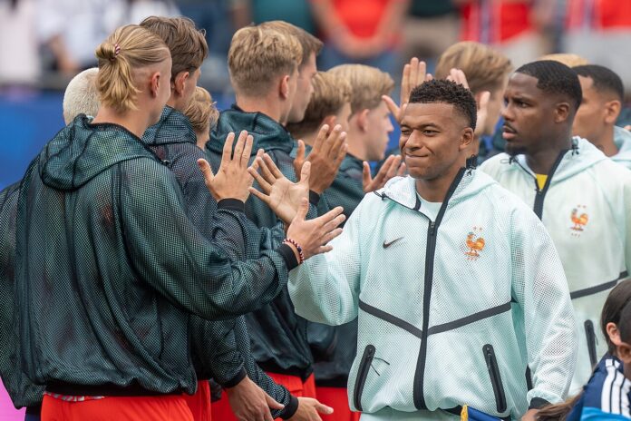 Kylian Mbappe greets Norway players before France’s international match in June 2026.