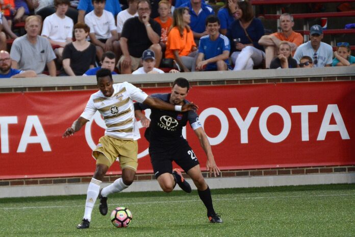 Mark-Anthony Kaye in action for Louisville City during a 2017 USL match against FC Cincinnati.