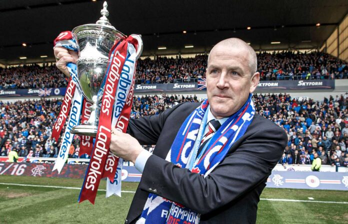 Mark Warburton celebrates with the trophy during his successful spell as Rangers manager.