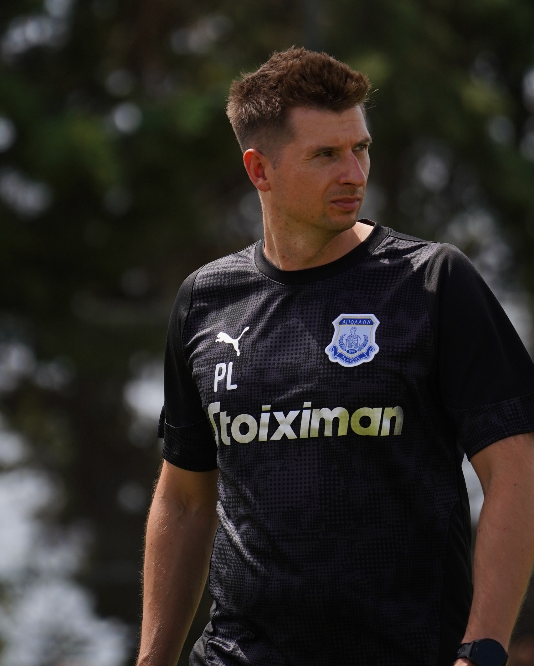 Przemysław Łagożny wearing Apollon Limassol training kit during a training session.