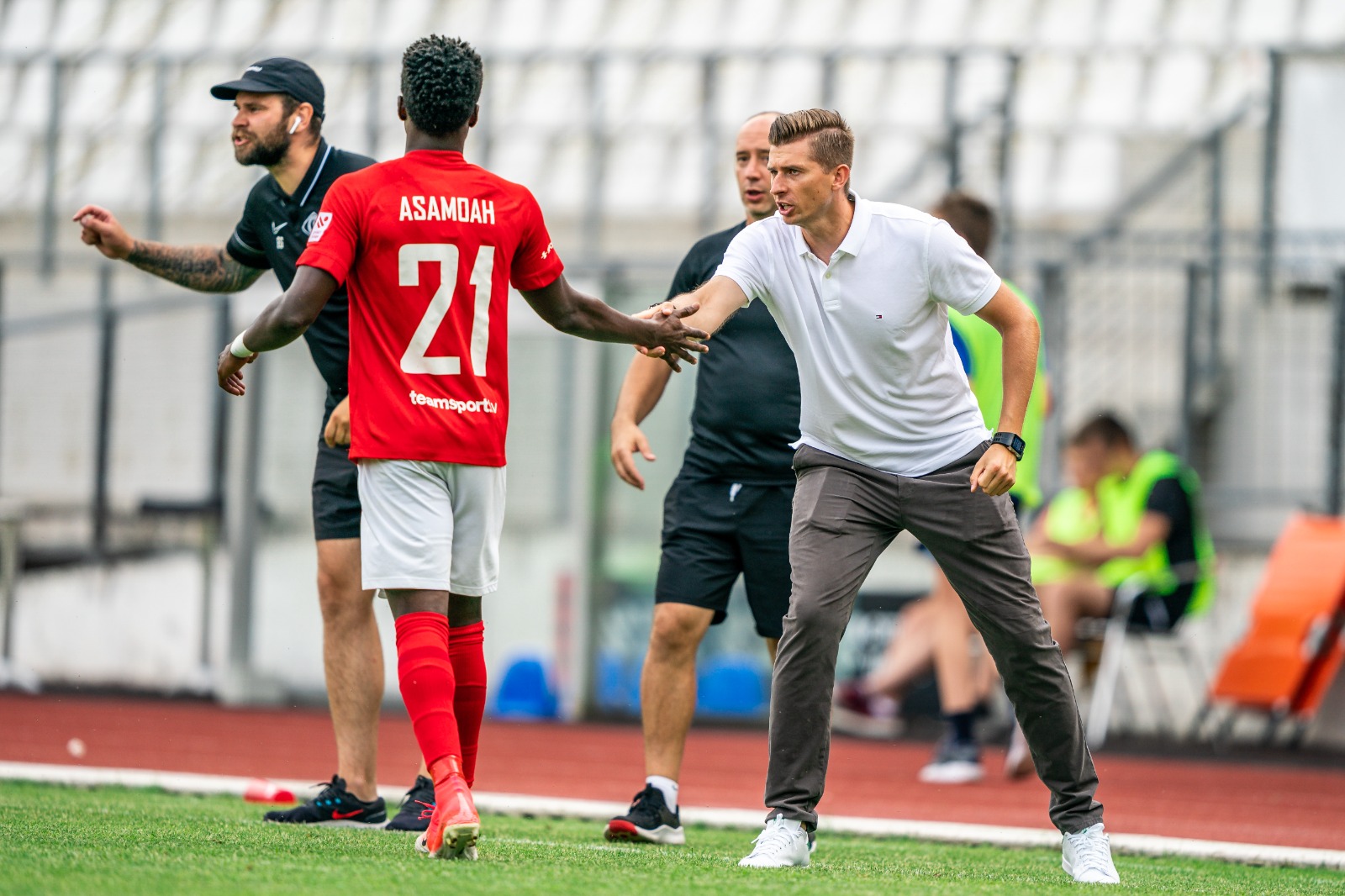 Przemysław Łagożny coaching from the touchline during his time as a first-team head coach in Latvia.