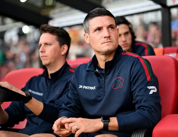Steve Colpaert on the SV Zulte Waregem bench in his role as assistant manager.